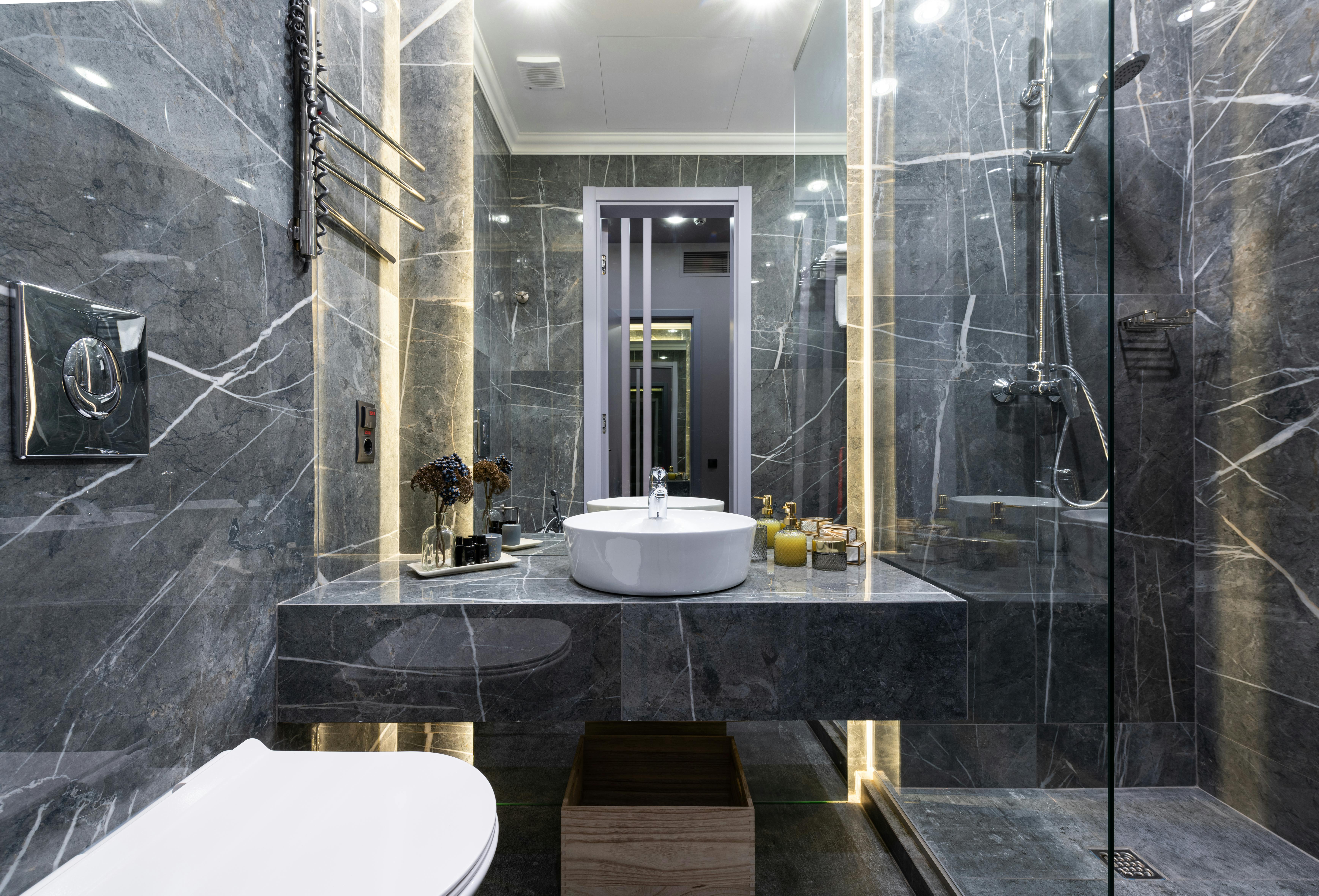 Modern bathroom with tiled shower and vanity